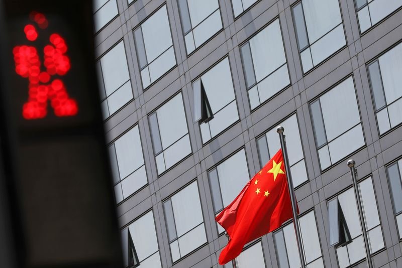 China securities regulator to check brokers’ financing needs after Huatai share plan